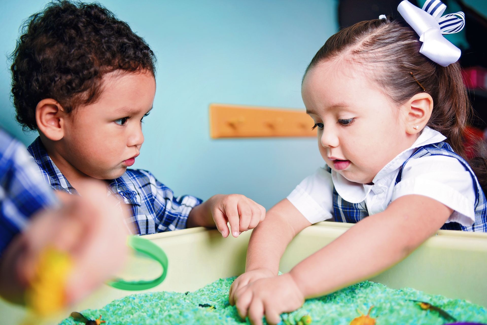 Children learning through play with high touch sensory games, Laredo, Tx.